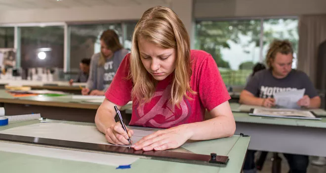 TCC Student in Aerospace Drafting class