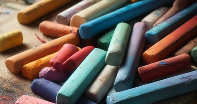 pile of soft pastels lay on a table