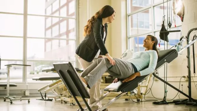 TCC student in the physical therapist assistant program works with a patient