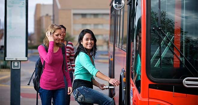 TCC students entering on a Tulsa Transit bus for free.