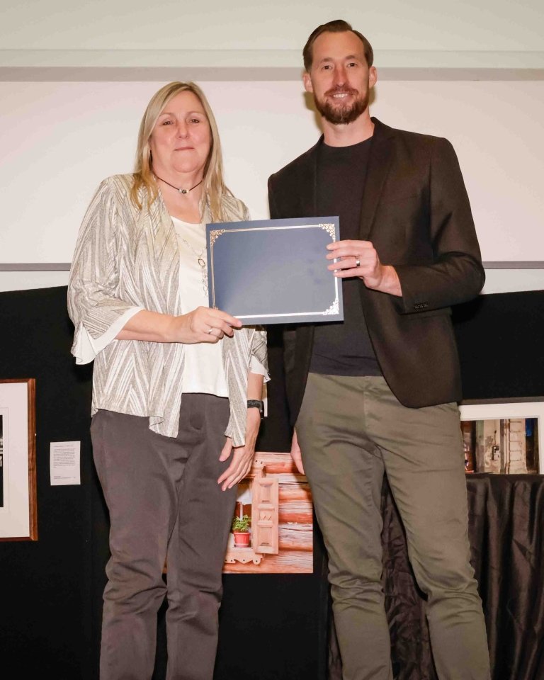 Wanda Knight receives her certificate of completion